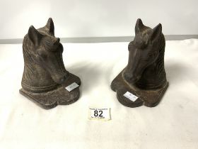 A PAIR OF IRON HORSE HEAD BOOKENDS.