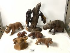 CARVED WOODEN SCULPTURE OF JAGUARS ON TREE; 30 CMS AND RHINOS, LION AND WILDERBEAST.