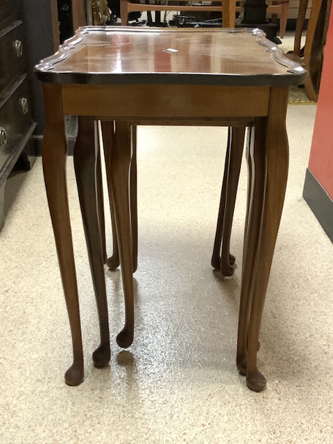 A WALNUT NEST OF THREE SHAPED TABLES. - Image 4 of 4