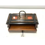 VICTORIAN WALNUT AND EBONISED RECTANGULAR DESK STAND WITH TWO INKWELLS AND DRAWER; 30 CMS.