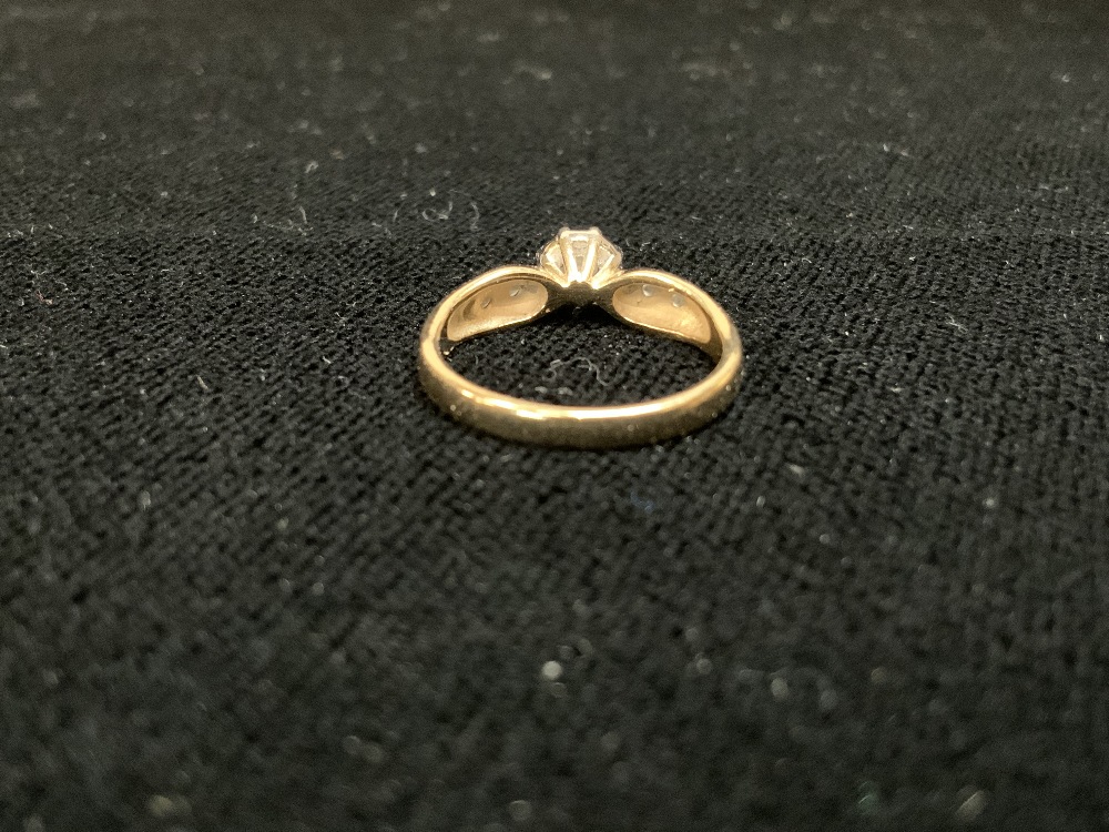 A 9CT HALLMARKED GOLD SOLITAIRE DIAMOND RING AND DIAMONDS IN SHOULDERS; SIZE J1/2; 2.1 GMS. - Image 3 of 5