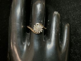 A 9CT HALLMARKED GOLD DIAMOND SET RING; SIZE P; 2.5 GMS.