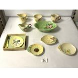 A SELECTION OF CARLTON WARE DISHES AND THREE MILK JUGS.