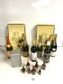 FOUR SMALL BOTTLES OF MOET CHANDON CHAMPAGNE, A BOTTLE OF ETTIENE DUMONT CHAMPAGNE, A BOTTLE OF