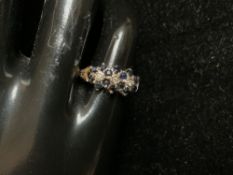 A 9CT HALLMARKED GOLD DIAMOND AND SAPPHIRE SET RING; SIZE J; 2.5 GMS.