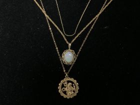 TWO 375 HALLMARKED GOLD PENDANTS ON CHAINS AND A FINE UNMARKED CHAIN; 5 GRAMS.