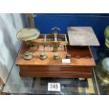 MAHOGANY AND BRASS POSTAL UNION SCALES WITH FOUR WEIGHTS; MADE BY S. MORDEN & CO.