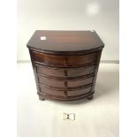 A MINIATURE APPRENTICE PIECE MAHOGANY FOUR DRAWER BOW FRONT CHEST; 23X17X24 CMS.