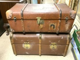 TWO VINTAGE CANVAS COVERED TRAVEL TRUNKS.