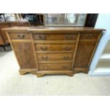 A SMALL REPRODUCTION YEWOOD BREAKFRONT SIDEBOARD; 116X34X72 CMS.