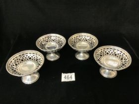 A SET OF FOUR EDWARDIAN HALLMARKED SILVER PEDESTAL BON-BON DISHES; CHESTER 1908; CORNELIUS