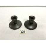 A PAIR OF TUDRIC PEWTER SQUAT CANDLESTICKS; 8CMS.