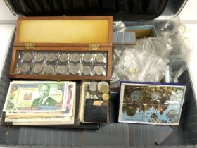 A QUANTITY OF USED MIXED COINAGE AND ENGLISH AND OTHER BANK NOTES.