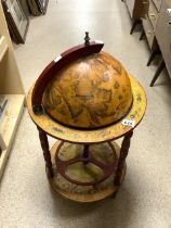 A GLOBE DRINKS TROLLEY.