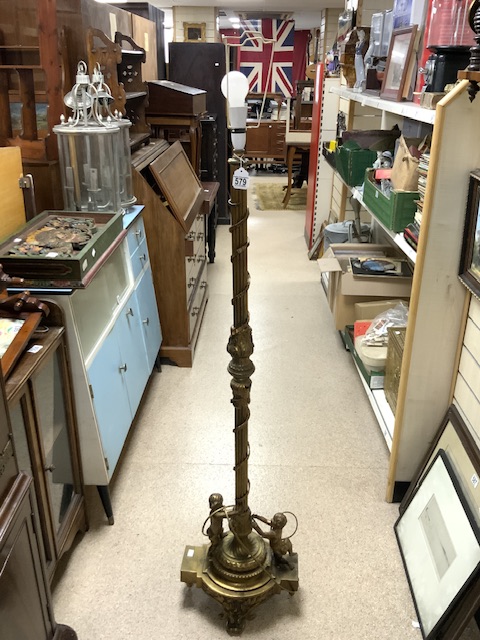 FRENCH ORNATE CORINTHIUM COLUMN ORMULO AND BRASS LAMP STAND WITH CHERUB SUPPORTS TO BASE.
