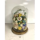 A VICTORIAN GLASS DOME; CIRCA 1870; CONTAINING A DISPLAY OF SHELL FORM FLOWERS; ON A GILTWOOD