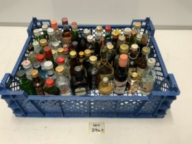 A QUANTITY OF MINIATURE SPIRITS - GIN, VODKA, MARTINI AND MORE.