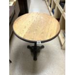 IRON BASED PUB TABLE WITH CIRCULAR OAK TOP; 62 CMS DIAMETER.