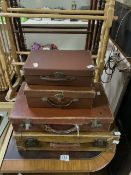 FOUR SMALL VINTAGE CASES.