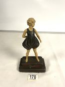 ART DECO FIGURE OF HOOP GIRL ON A STEPPED METAL BASE; 22 CMS.