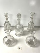 A HEAVY CUT GLASS DECANTER, PAIR OF ETCHED SHERRY DECANTERS AND TWO OTHER DECANTERS.