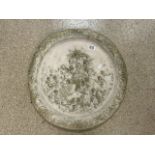 A CIRCULAR PLASTER WALL PLAQUE WITH CHERUBS AND ANGELS IN RELIEF; 58 CMS DIAMETER.