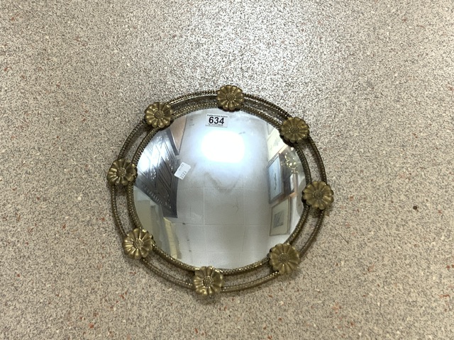 A METAL FRAMED CONVEX WALL MIRROR; 37 CMS.