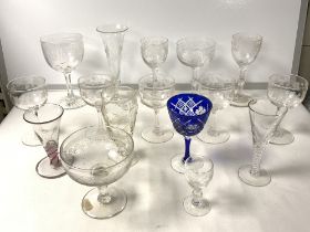 QUANTITY OF CUT AND ENGRAVED DRINKING GLASSES, INCLUDES A LIQUER GLASS WITH COLOURED SPIRAL TWIST