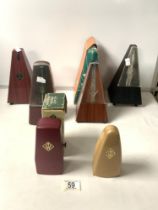 SIX VINTAGE METRONOMES.