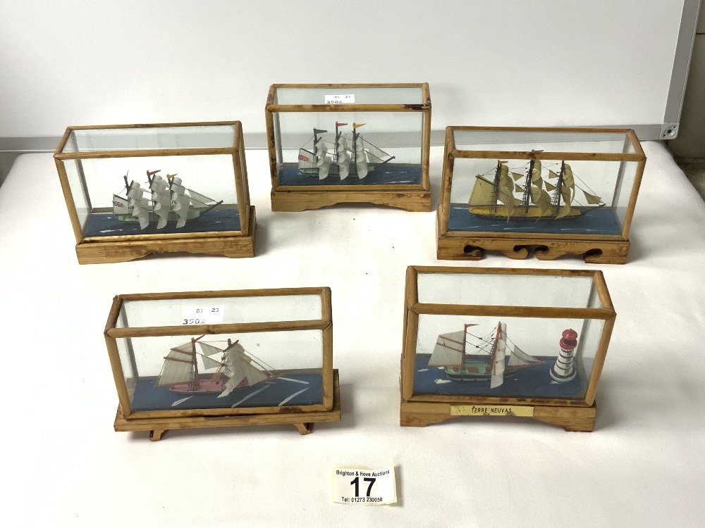 FIVE MINATURE MODEL SAILING SHIPS IN GLAZED BAMBOO CASES; 14X10 CMS