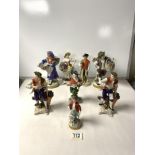 A PAIR OF CONTINENTAL PORCELAIN FIGURES OF FLOWER SELLERS; 20 CMS AND SIX OTHER PORCELAIN FIGURES.