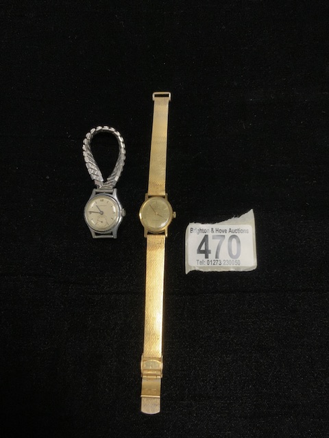 A LADIES OMEGA GOLD-PLATED WRISTWATCH (NON-MATCHING STRAP) AND A LADIES GIRARD-PERREGAUX WRISTWATCH.