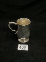 A SMALL HALLMARKED SILVER TANKARD; BIRMINGHAM 1938; 102 GRAMS.