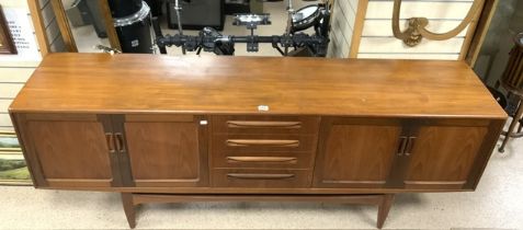 A MID-CENTURY TEAK SIDEBOARD WITH FOUR DOORS AND FOUR CUPBOARDS; 214X46X80 CM.