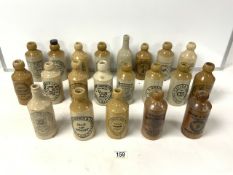 TWENTY ONE STONEWARE GINGER BEER BOTTLES,