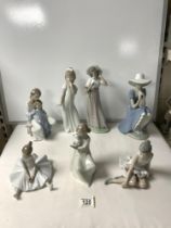 SEVEN NAO FIGURES VARIOUS INCLUDING A BALLERINA; LARGEST 31 CMS.