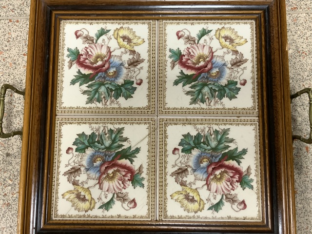 A LATE VICTORIAN FLORAL TILE TOP TRAY; 38CMS SQUARE.