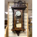 GERMAN 8 DAY WALNUT CASED WALL CLOCK.