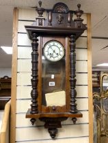 GERMAN 8 DAY WALNUT CASED WALL CLOCK.