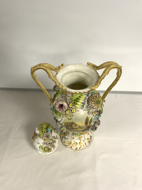 A COALPORT DESIGN PORCELAIN AND FLORAL ENCRUSTED SNAKE HANDLE VASE WITH HAND-PAINTED PANEL; 43 CM. - Image 5 of 6