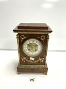 A FRENCH EMPIRE STYLE MAHOGANY MANTLE CLOCK WITH GILT METAL APPLIED DECORATION; JW BENSON LONDON [