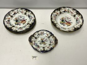 FOUR 19TH CENTURY MINTON AND HOLLINS PATTERN DINNER PLATES, TWO SOUP BOWLS AND A SIDE PLATE.