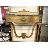 A SHAPED MARBLE TOP GILT CONSOLE TABLE; 62X68 CMS.