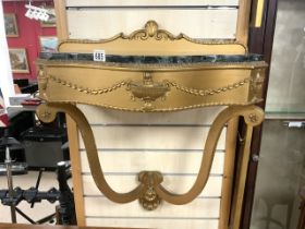 A SHAPED MARBLE TOP GILT CONSOLE TABLE; 62X68 CMS.