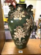 A JAPANESE SATSUMA GREEN GROUND VASE WITH FLORAL DECORATION; 46 CMS.