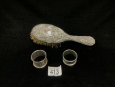 HALLMARKED SILVER BACK HAIRBRUSH AND 2 SILVER NAPKIN RINGS.