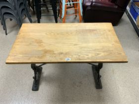 WOODEN TOP PUB TABLE WITH CAST METAL BASE; 107 X 61CM