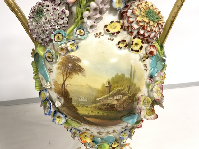 A COALPORT DESIGN PORCELAIN AND FLORAL ENCRUSTED SNAKE HANDLE VASE WITH HAND-PAINTED PANEL; 43 CM. - Image 4 of 6