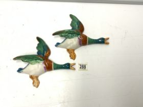 TWO PORCELAIN FLYING DUCKS.