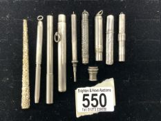 A STERLING SILVER LEAD HOLDER AND 8 OTHER HOLDERS AND PENCILS.